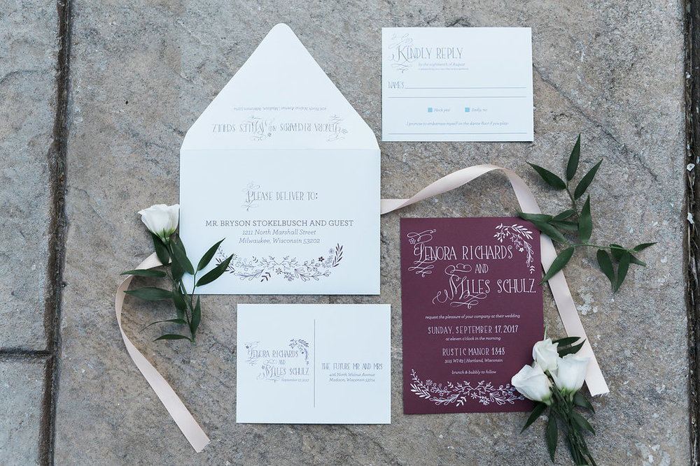  Each guest received these dusty blue and burgundy invitations. We love the simplicity! 
